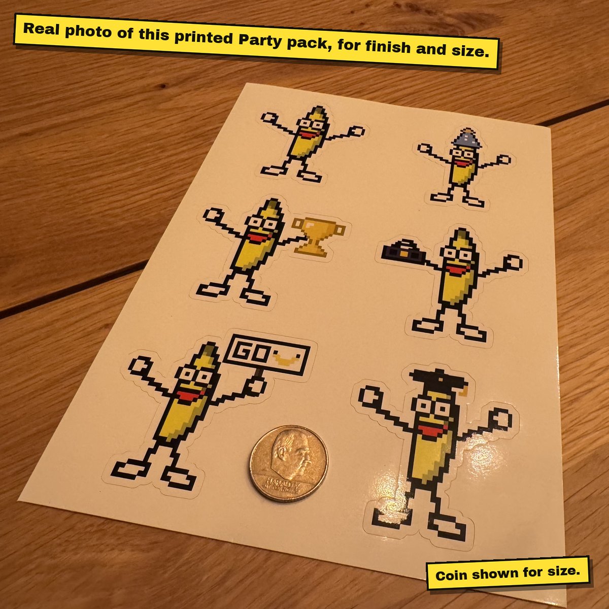 Printed A5 sticker sheet of pixel bananas on a wooden table.